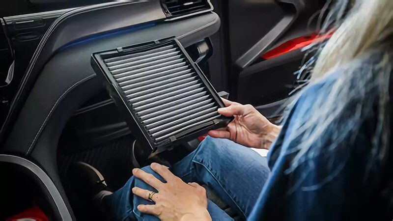 Luxury car cabin filter replacement, showcasing clean air quality