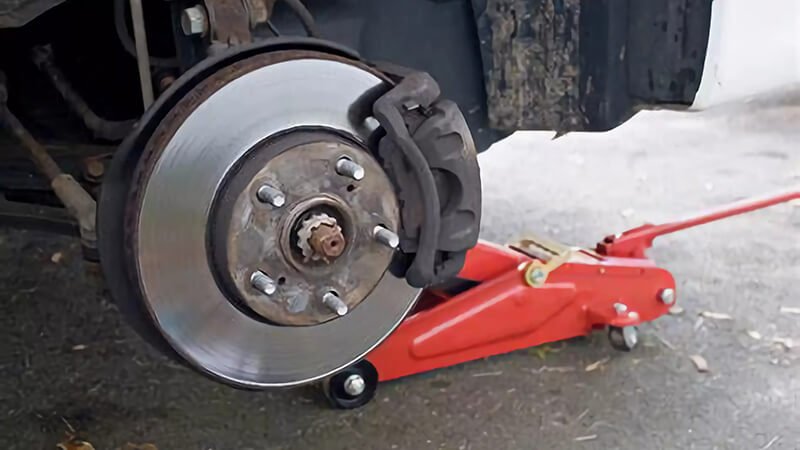 Worn SUV brake pads, needing replacement to ensure safe driving