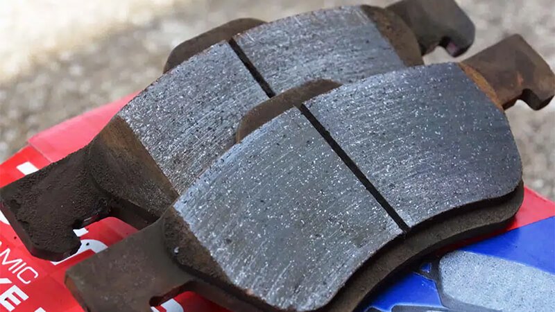 Worn brake pads, close-up view